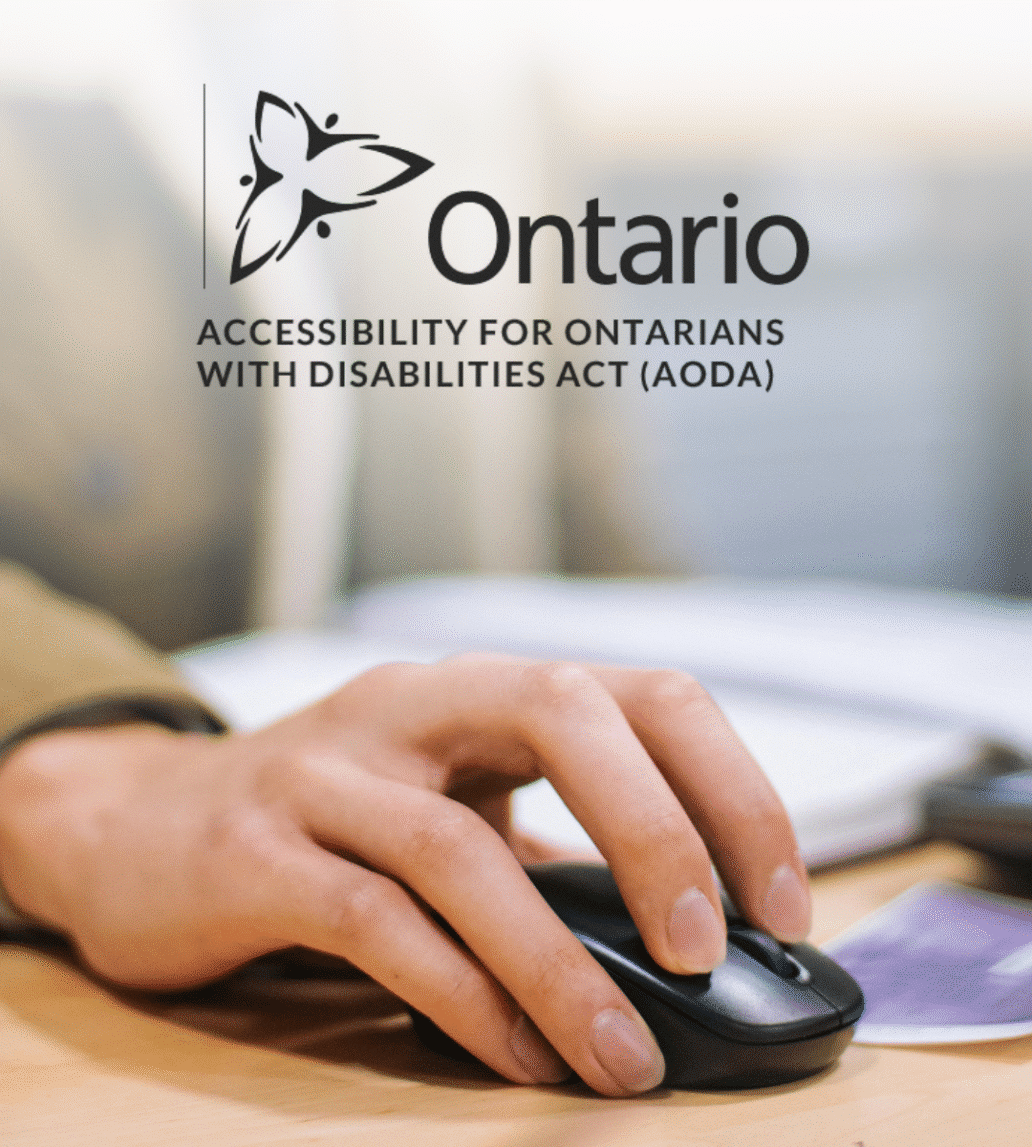 A person’s hand using a computer mouse, with the Ontario logo and the text “Accessibility for Ontarians with Disabilities Act (AODA)” displayed above—highlighting its importance in municipal government.